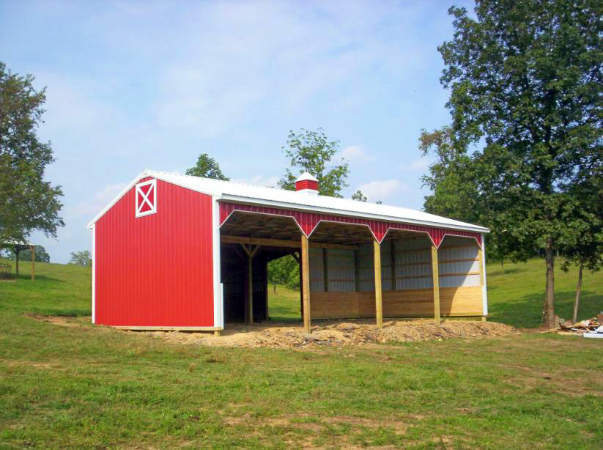 red and white open shed row barn