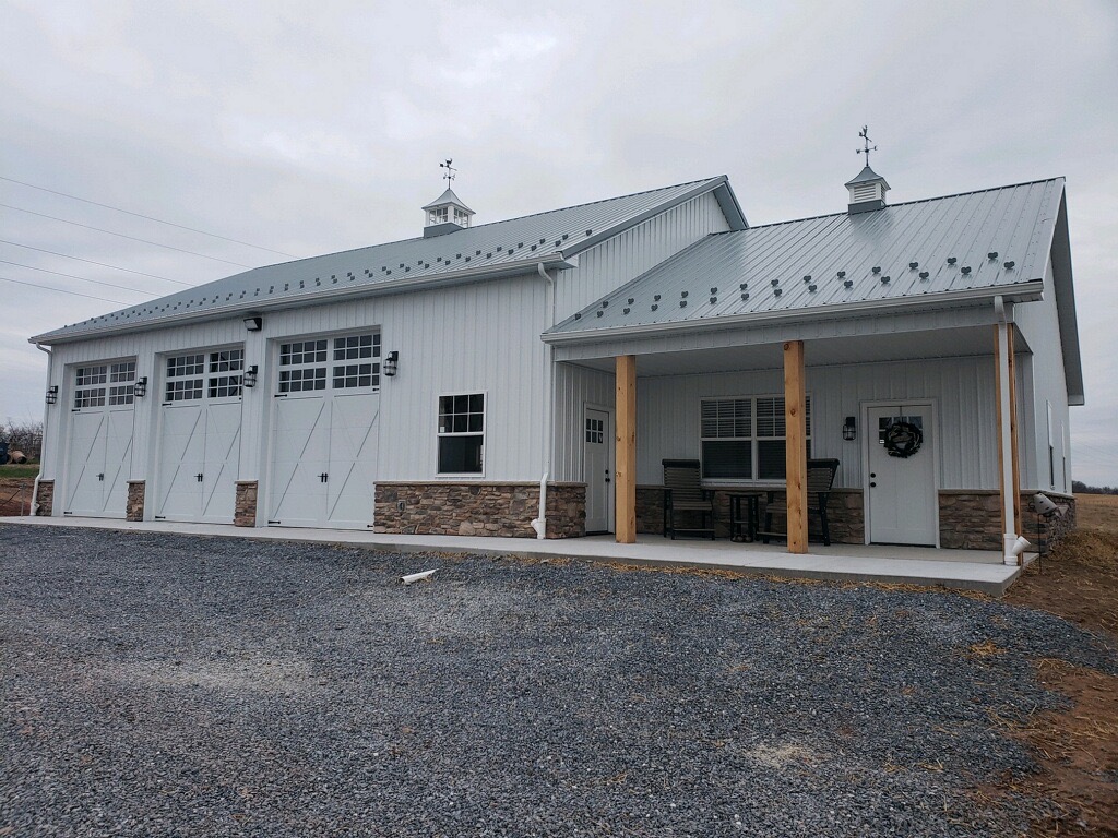 three car pole barn garage with attached home addition