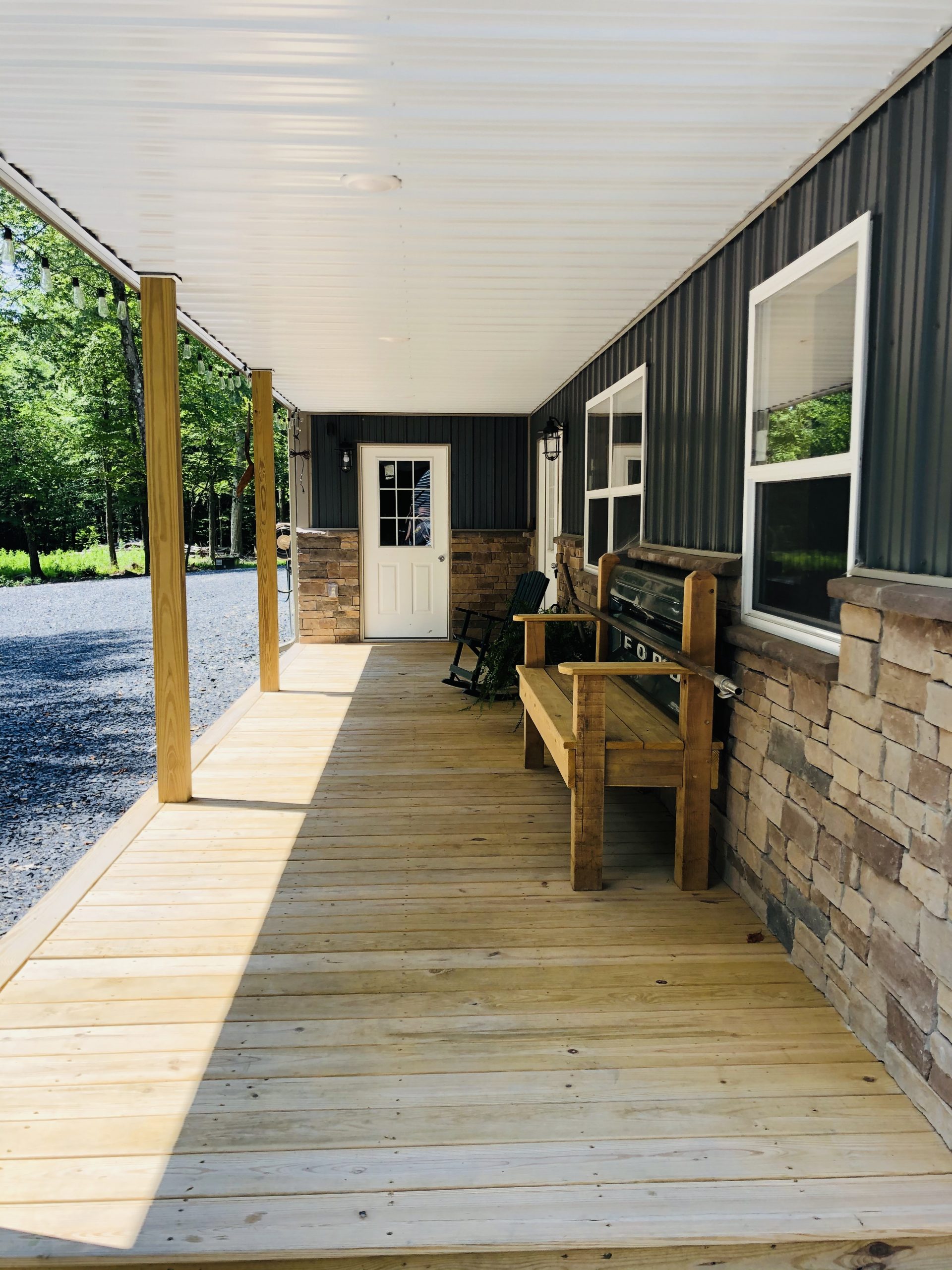 porch under metal overhang on commercial building