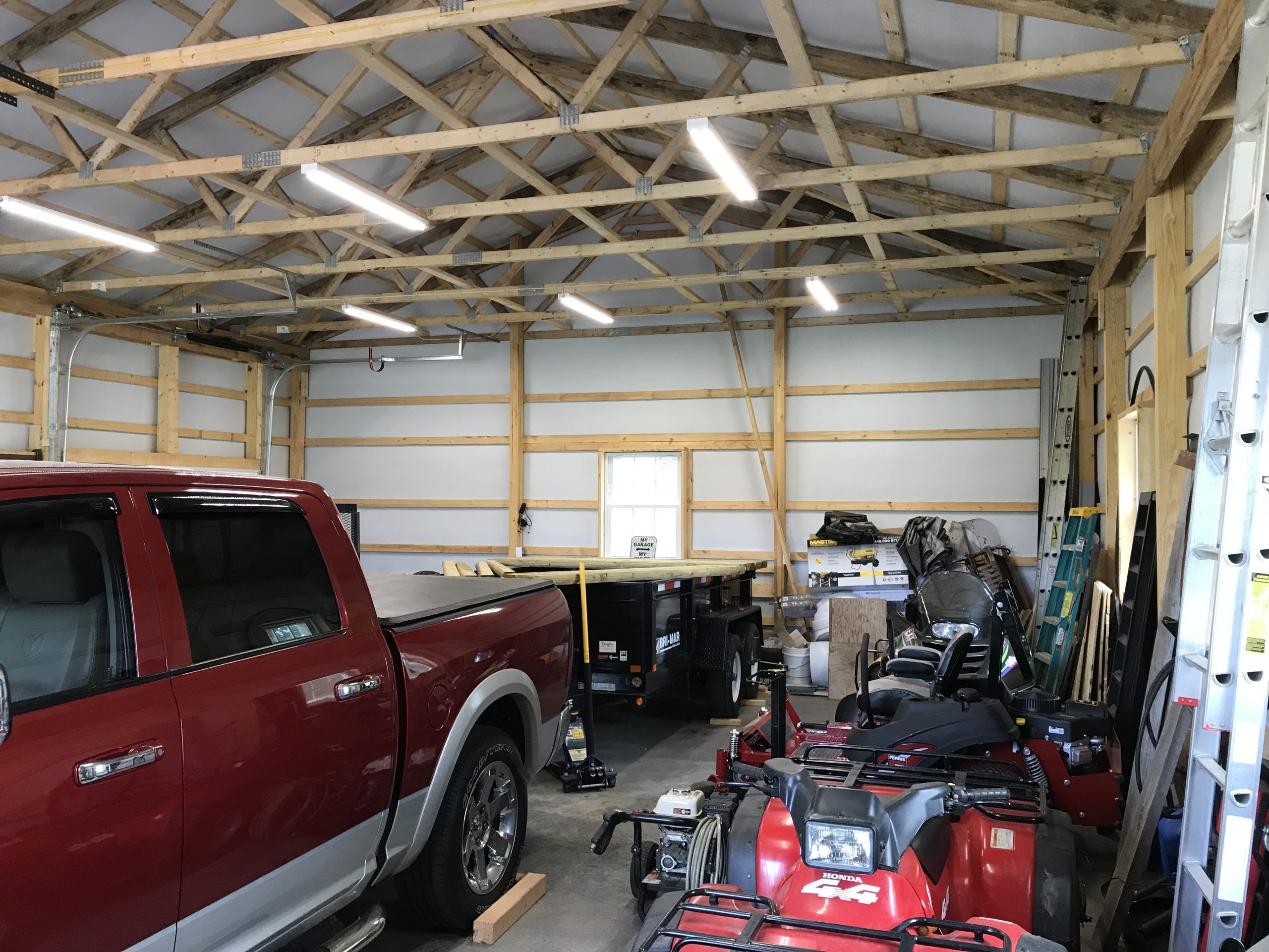 wooden beams on interior roof of garage